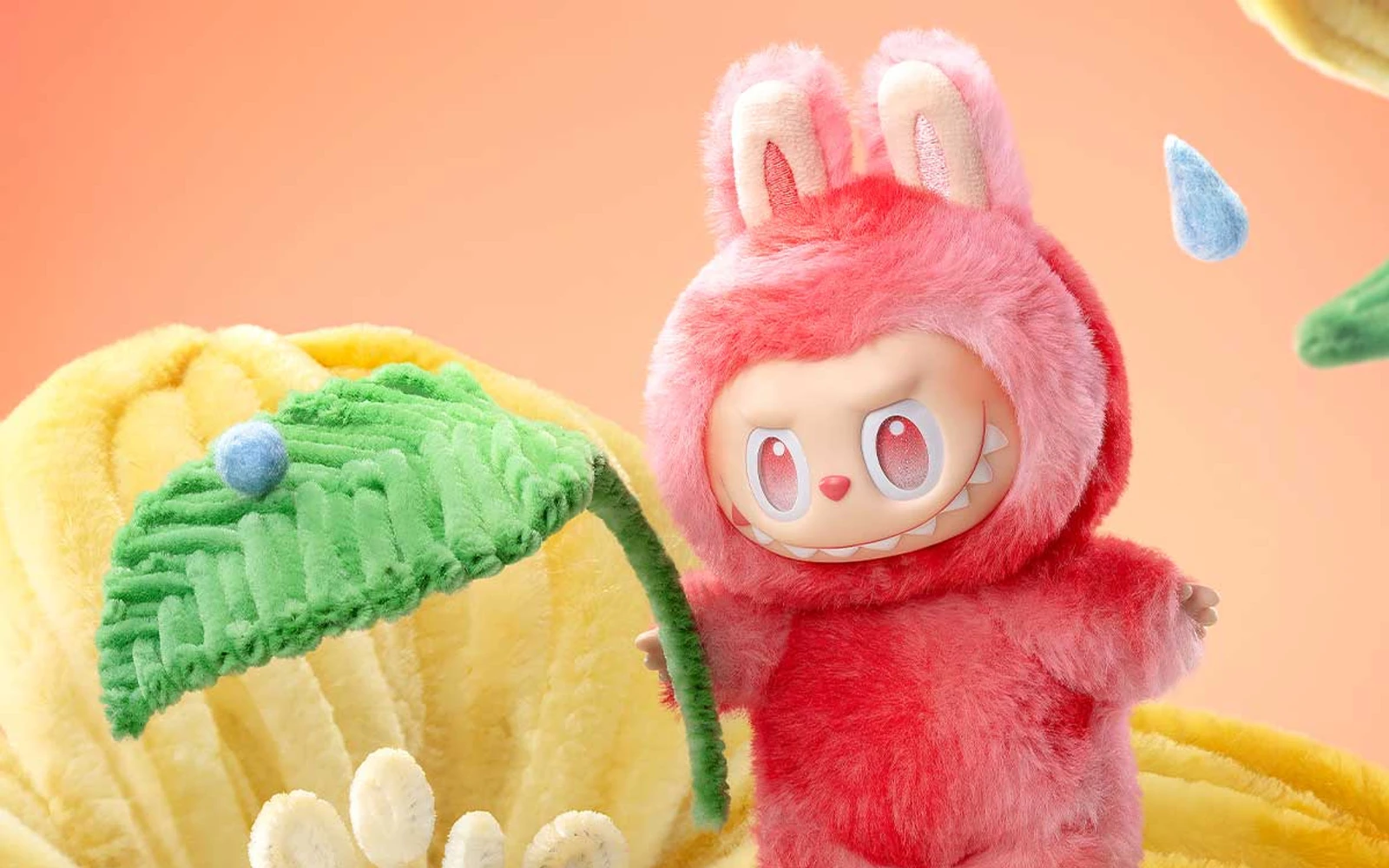 Close view of LABUBU from Big into Energy, with long ears and a toothed grin, on a yellow plush set.