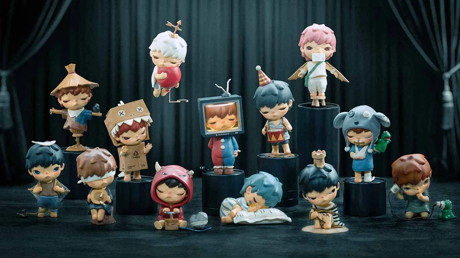 HIRONO Mime Series figures in varied costumes on a dark theatrical set.