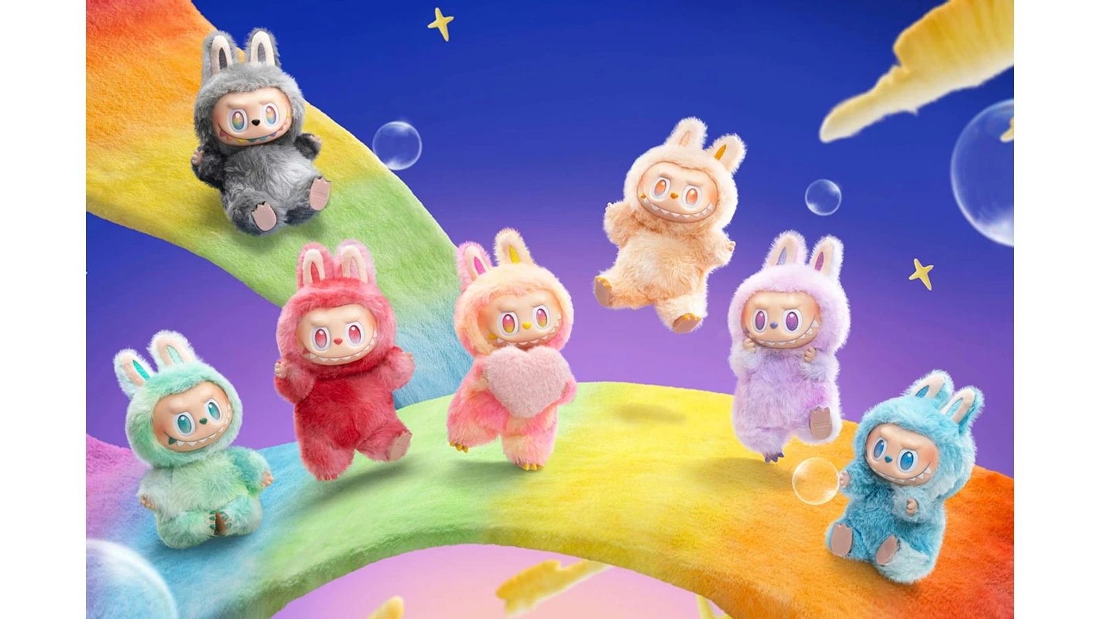 Seven LABUBU Big into Energy vinyl plush variants on a rainbow plush set.