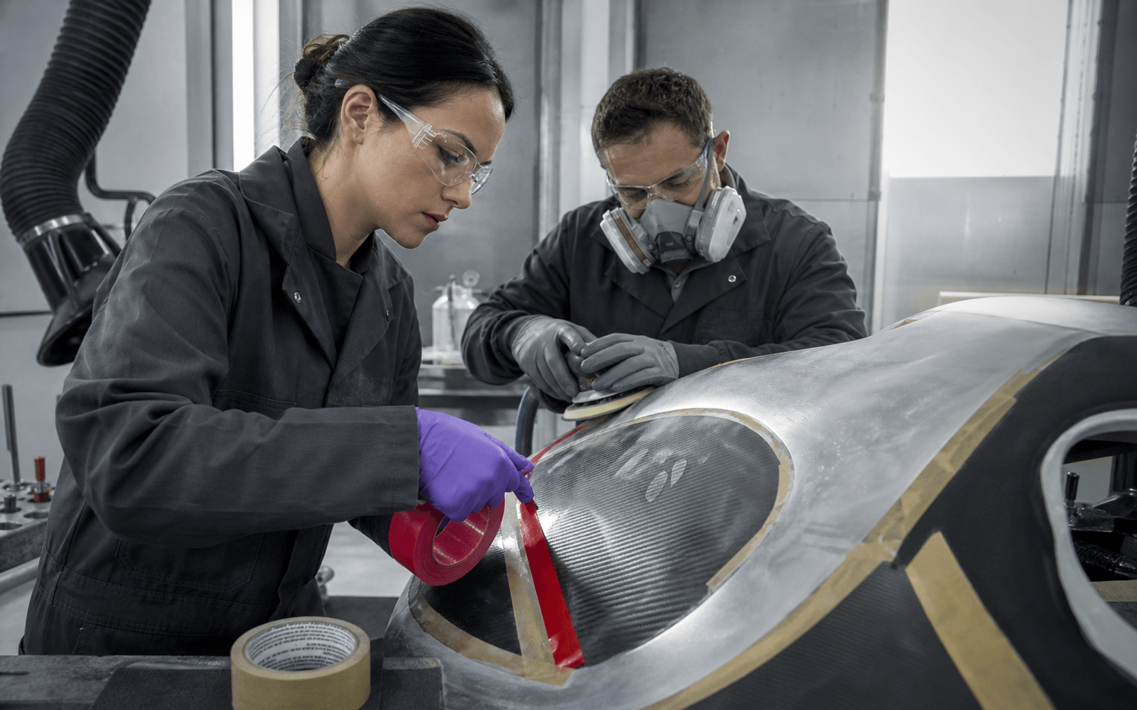Photorealistic materials-science scene connecting industrial engineering, safety, and everyday product use without visible logos.
