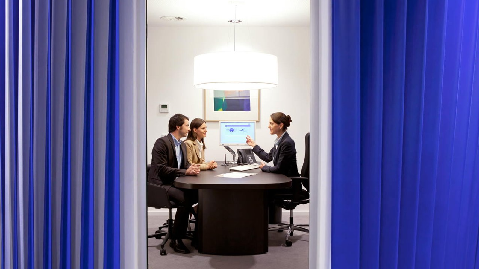 Deutsche Bank advisory setting proof scene.