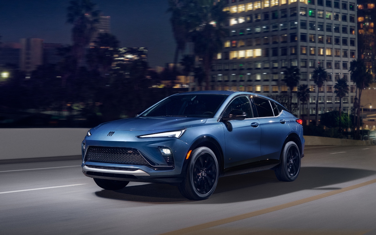 Buick SUV photographed in an official General Motors brand card.
