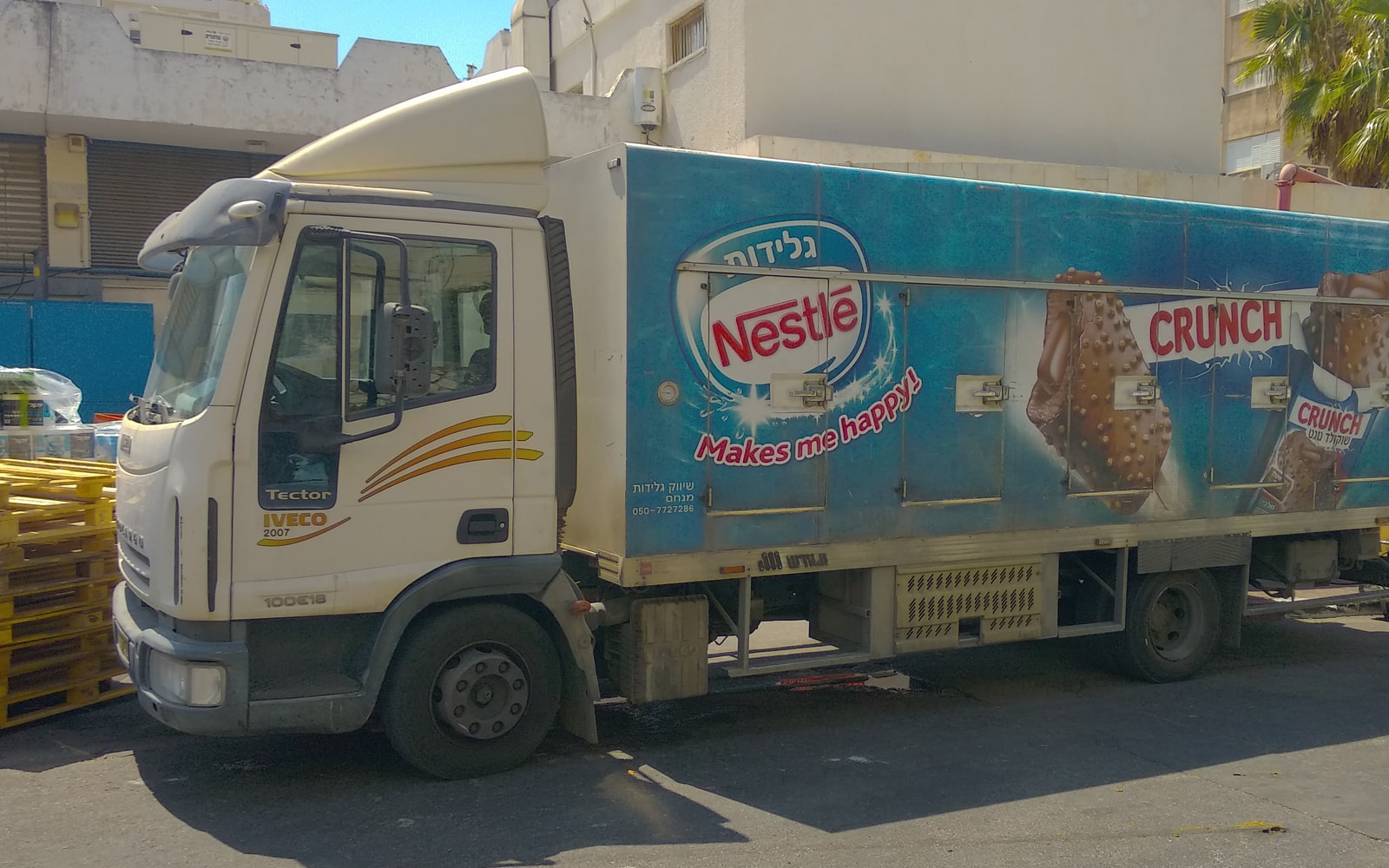 Nestle ice cream delivery truck with Nestle and Crunch brand cues visible.
