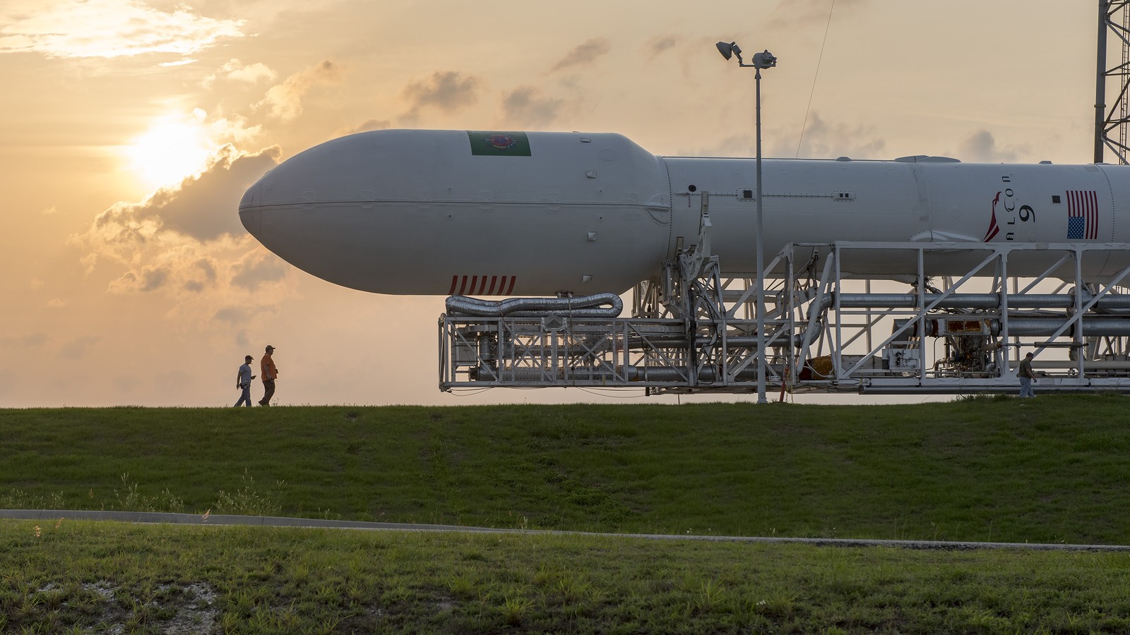 Falcon 9 rocket rollout to the launch pad.
