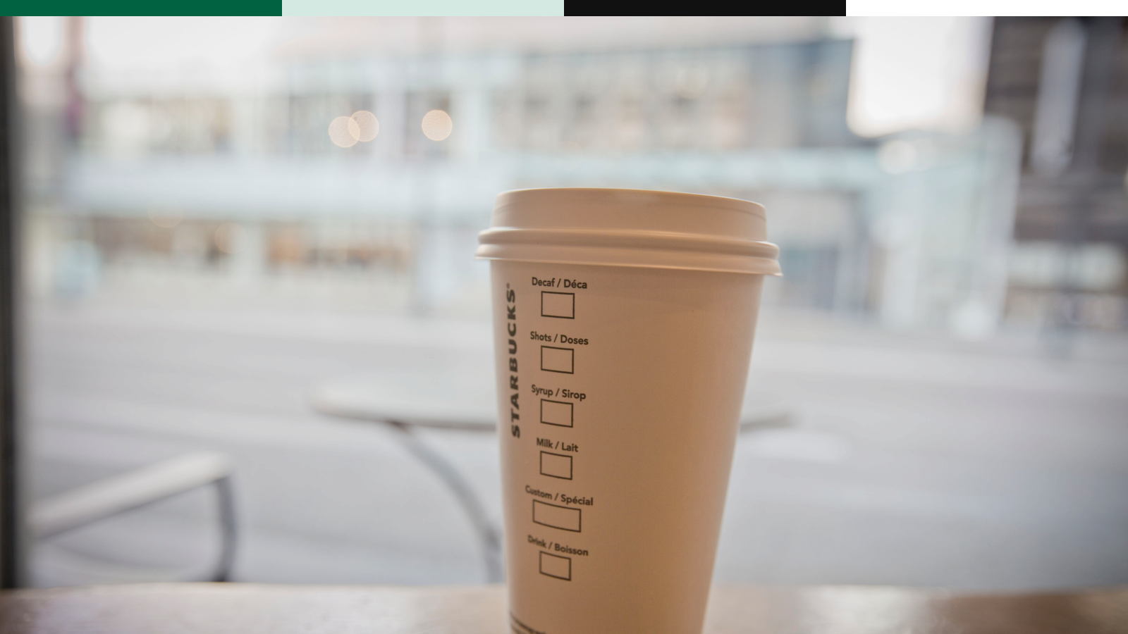 Starbucks cup as a carried service object.