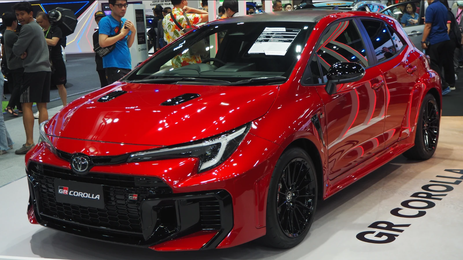 Red Toyota GR Corolla on display.