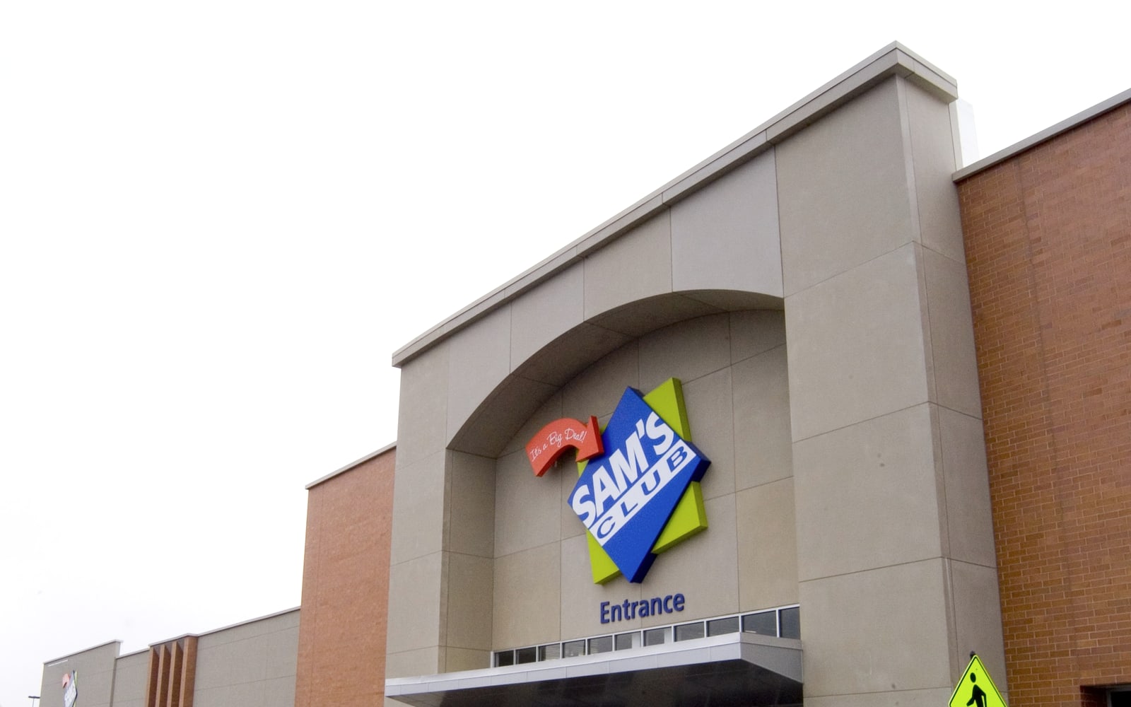 Sam's Club exterior with warehouse-club entrance visible.