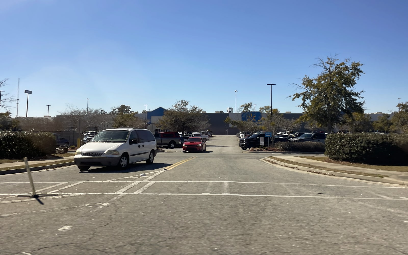 Walmart store exterior with the blue sign and everyday retail frontage visible.