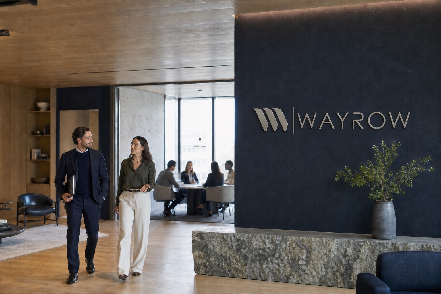 Consultant and client moving through an active Wayrow workplace