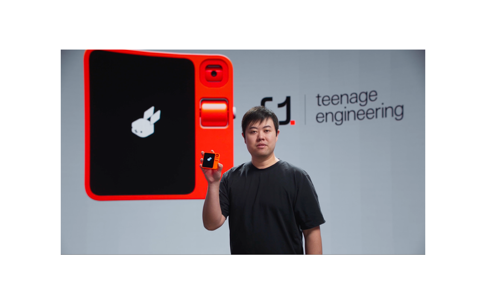Rabbit R1 launch speaker and orange device