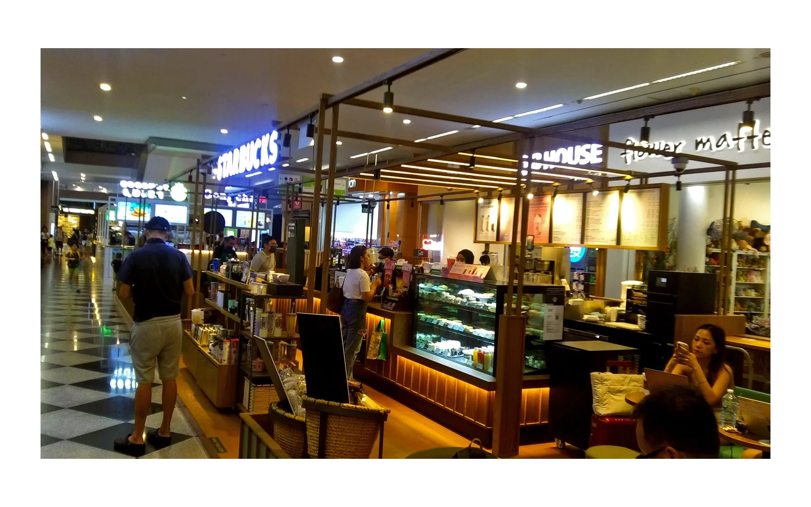Customers at a Starbucks coffeehouse in Singapore