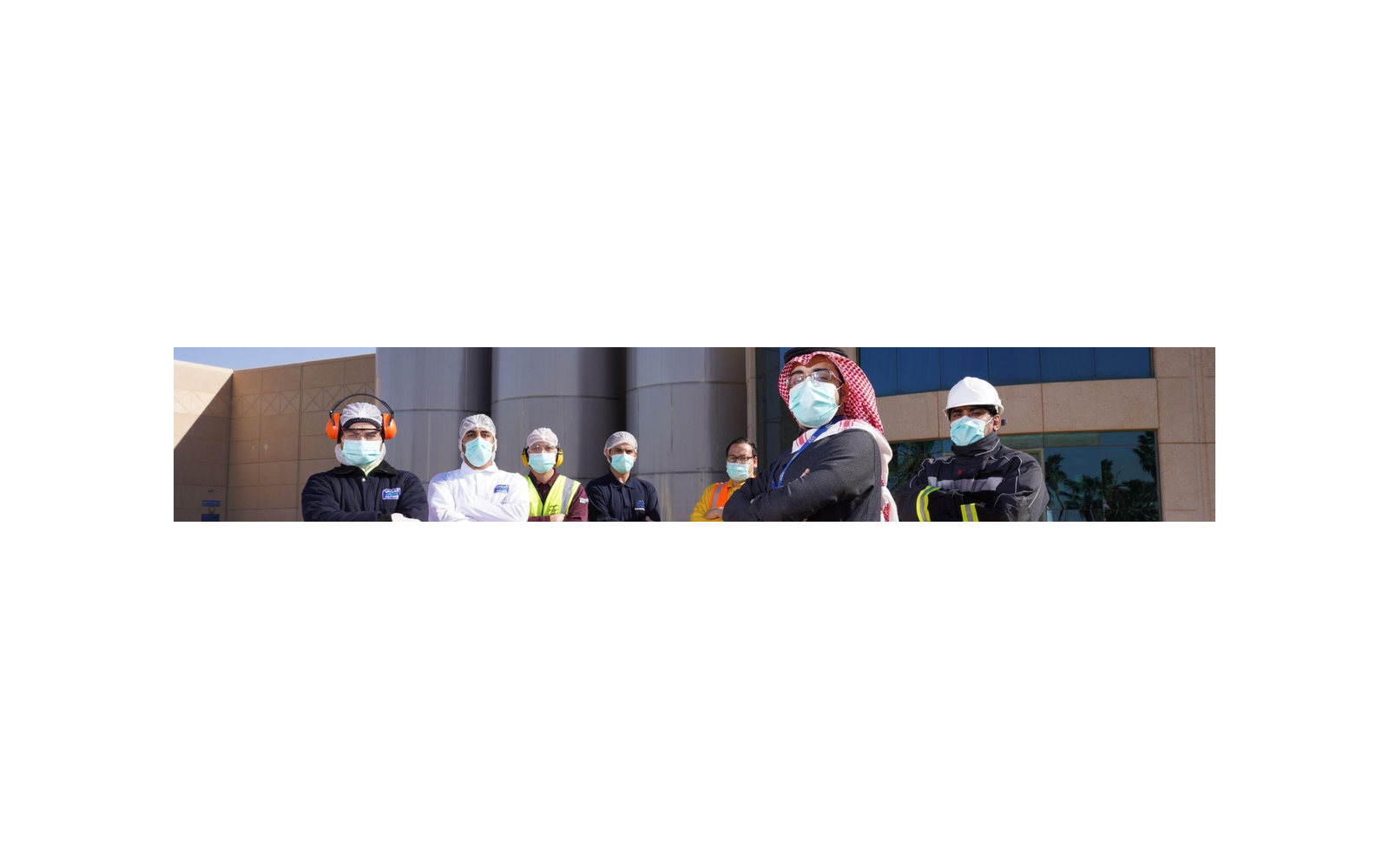 Almarai employees wearing safety equipment