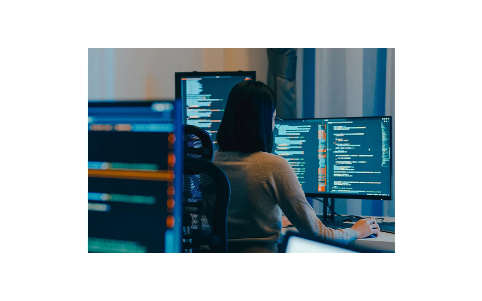 BBVA employee working at computer screens