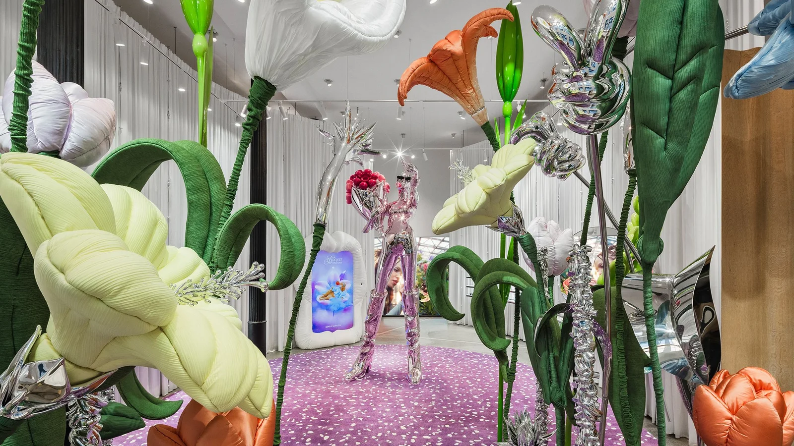 Surreal Gentle Monster store installation with oversized plants and metallic figures.