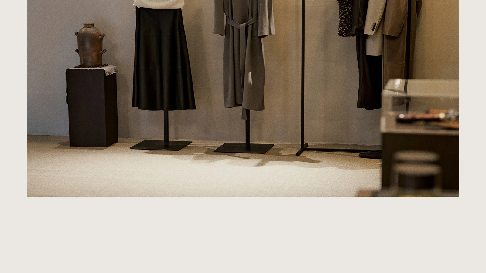 Neutral Massimo Dutti garments displayed in the Shanghai project.