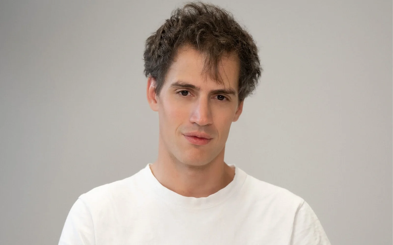 Official Mistral AI portrait of co-founder Arthur Mensch from the company About page.