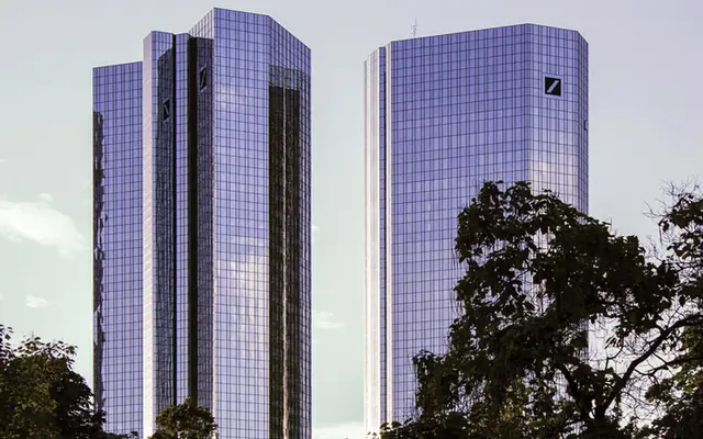 Deutsche Bank Frankfurt towers with visible source-backed building marks.