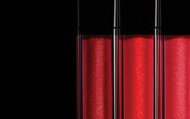 Official Estée Lauder Companies portfolio image showing red lip color product detail.